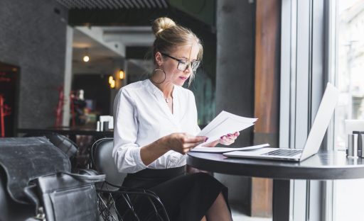 woman-examining-document-restaurant